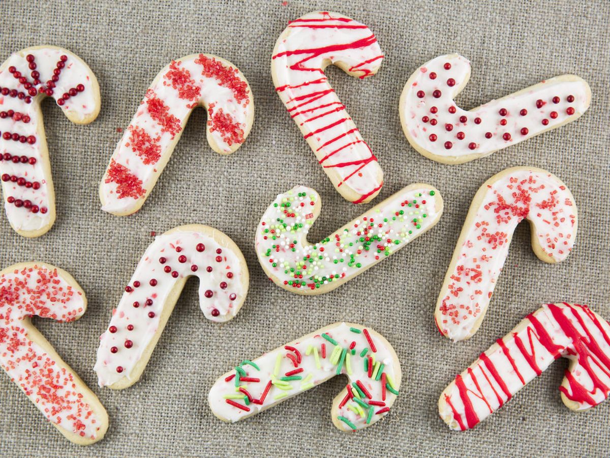 Candy cane cookies on a linen background.