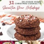 A festive display of vegan Christmas cookies, featuring chocolate cookies with peppermint, jam thumbprints, and decorated shortbread varieties alongside holiday greenery and text.
