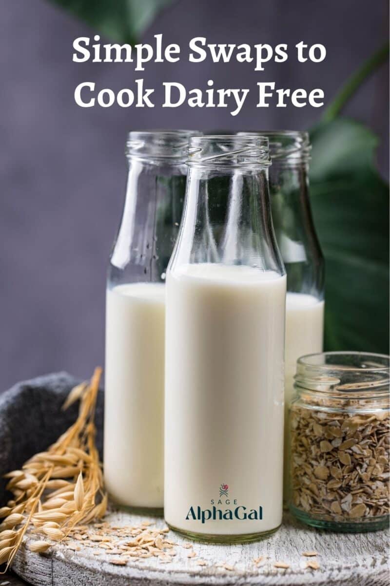 Three glass bottles of plant-based milk and a jar of oats on a tray, with text: "Simple Swaps to Cook Dairy Free" at the top.