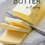 Sliced butter with a knife on a cutting board. Text overlay reads, "How to Substitute Butter in Baking.