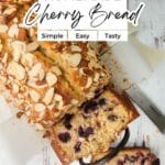 A loaf of homemade cherry bread topped with almond slices, partially sliced on a wooden cutting board with a serrated knife labeled "Sweet & Nutty Homemade Cherry Bread - Simple, Easy, Tasty.