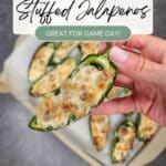 A person's hand holding a stuffed jalapeno above a tray of stuffed jalapenos. Text reads: "Quick & Easy Stuffed Jalapenos - Great for Game Day!.