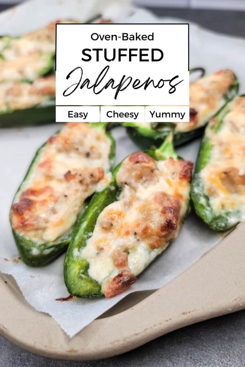 Close-up of oven-baked stuffed jalapenos topped with melted cheese, arranged on a parchment-lined baking sheet. Text overlay reads: "Oven-Baked Stuffed Jalapenos - Easy, Cheesy, Yummy.