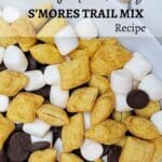 Close-up of a s'mores trail mix with golden cereal squares, marshmallows, and chocolate chips, placed in a white bowl. Text reads: "fast and easy S’MORES TRAIL MIX Recipe.