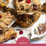 Granola bars with chia seeds and cranberries are stacked on parchment paper. The text below reads, "Simple Tips for Baking with Chia Seeds.