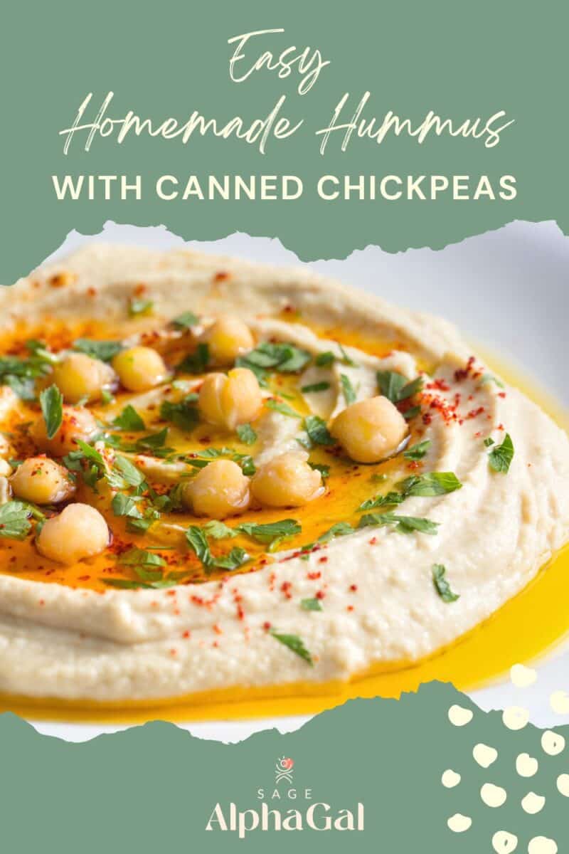 Plate of hummus topped with canned chickpeas, herbs, and spices on a green background. Text reads: "Easy Homemade Hummus with Canned Chickpeas.