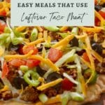 A pizza topped with ground meat, tomatoes, green onions, black olives, and shredded cheese. Text overlay: "35+ Easy Meals That Use Leftover Taco Meat.