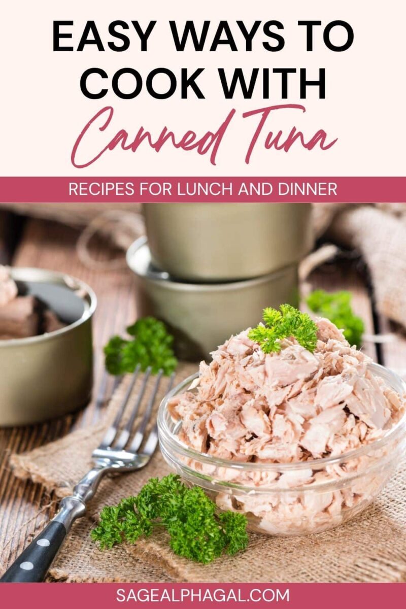 A glass bowl filled with canned tuna, garnished with parsley, placed on a wooden table beside metal bowls and a fork. Text reads: &ldquo;Easy Ways to Cook with Canned Tuna.&rdquo;.